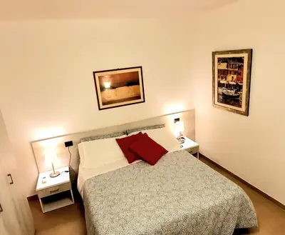 Letto o letti in una camera di Affittacamere L'Orto dei nonni