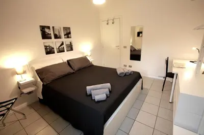 Letto o letti in una camera di Casa Bebe - adiacenze Policlinico e Universita'