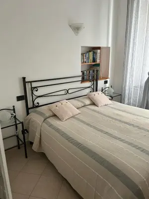 Letto o letti in una camera di Appartamento in tipico carugio ligure