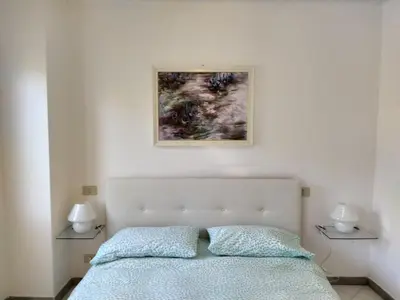 Letto o letti in una camera di Mara House