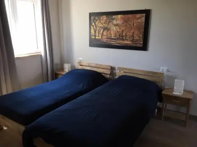 Letto o letti in una camera di Agriturismo Il Capitolo