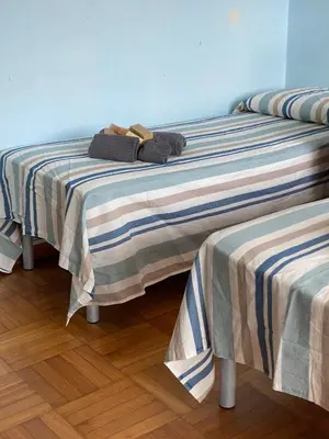 Letto o letti in una camera di Grande Attico con Vista Vicino al Centro by PortofinoVacanze