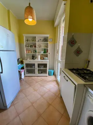 Cucina o angolo cottura di Grande Attico con Vista Vicino al Centro by PortofinoVacanze
