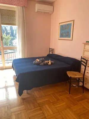 Letto o letti in una camera di Grande Attico con Vista Vicino al Centro by PortofinoVacanze