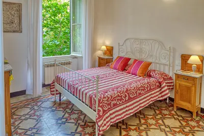 Letto o letti in una camera di Leone I and Leone II Apartments