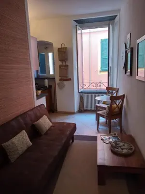 Area soggiorno di Dume Cosy Apt - Central - Near the beach with A.C.