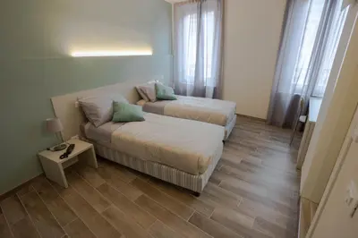 Letto o letti in una camera di Hotel Cavallo Bianco