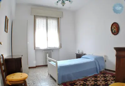 Letto o letti in una camera di Lombardi Rognoni