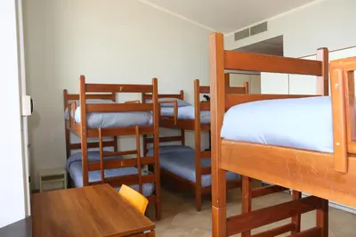 Letto o letti in una camera di Student's Hostel Parma