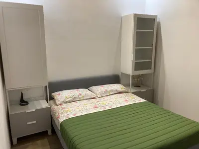 Letto o letti in una camera di CASA VACANZA CON PISCINA,AREA GIOCHI BAMBINI.