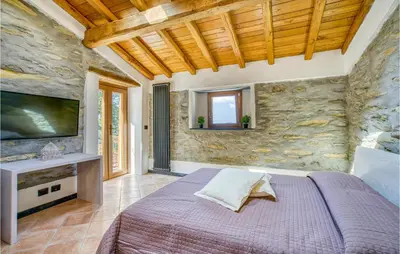 Letto o letti in una camera di Perla