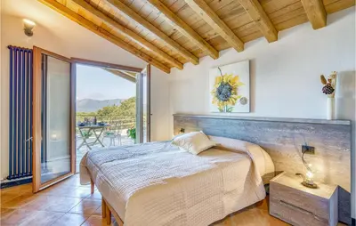 Letto o letti in una camera di Perla