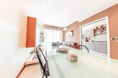 Area soggiorno di Casa Luca Flexyrent - Parking - A C - WiFi