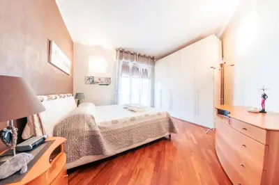 Letto o letti in una camera di Casa Luca Flexyrent - Parking - A C - WiFi