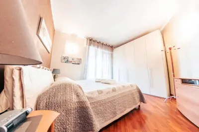 Letto o letti in una camera di Casa Luca Flexyrent - Parking - A C - WiFi