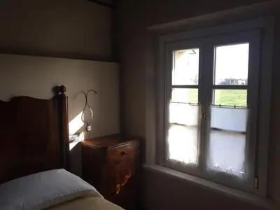 Letto o letti in una camera di Corte Motte
