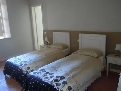 Letto o letti in una camera di Ostello La Canonica