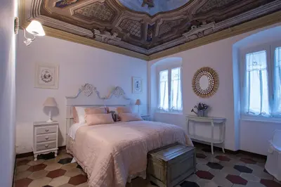 Letto o letti in una camera di Appartamento Il Sogno Maison de Charme