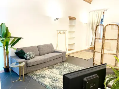 Area soggiorno di The Jungle Apartment