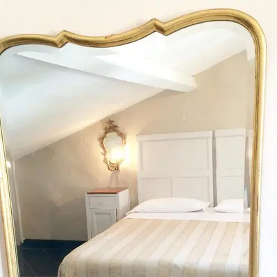 Letto o letti in una camera di AGRITURISMO CASA OLIVIERI