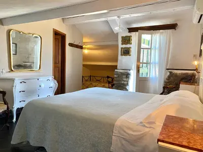 Letto o letti in una camera di AGRITURISMO CASA OLIVIERI