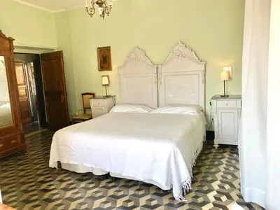 Letto o letti in una camera di AGRITURISMO CASA OLIVIERI