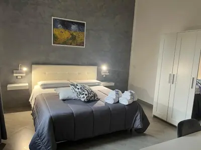 Letto o letti in una camera di B&B La Villetta