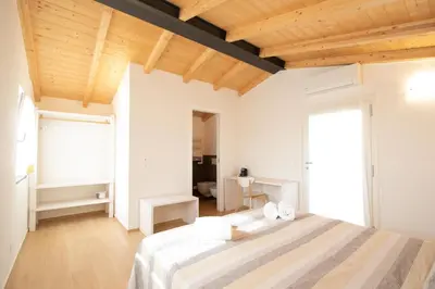 Letto o letti in una camera di Agriturismo Eos