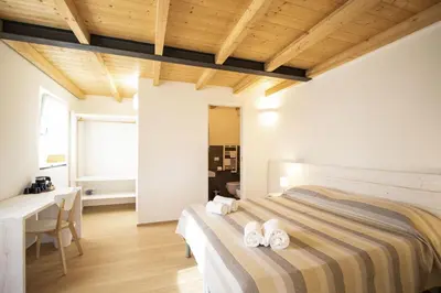 Letto o letti in una camera di Agriturismo Eos