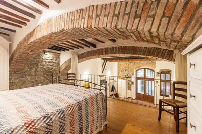 Letto o letti in una camera di 025- La casa di Esmeralda (011017-LT-0667)