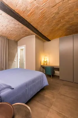 Letto o letti in una camera di Torre 13