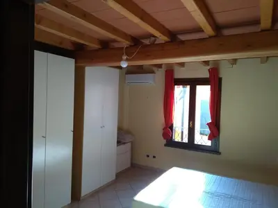 Letto o letti in una camera di B&B I GEMELLI