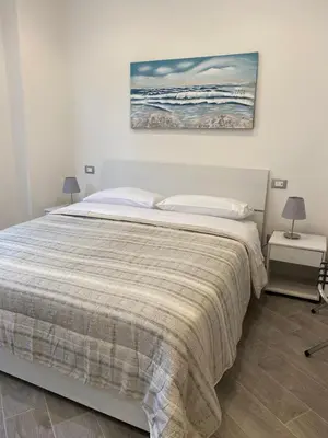 Letto o letti in una camera di Affittacamere La Riviera
