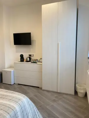 Letto o letti in una camera di Affittacamere La Riviera