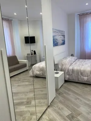 Letto o letti in una camera di Affittacamere La Riviera