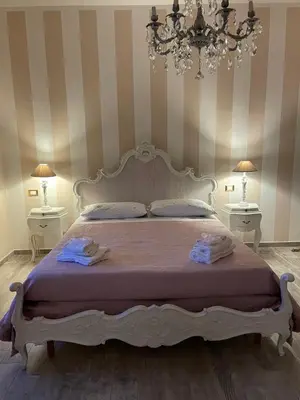 Letto o letti in una camera di Annali Casa vacanze - Shabby style nella natura