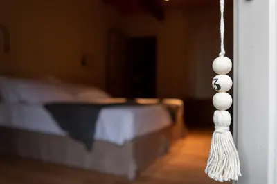 Letto o letti in una camera di Tenuta Pizzone Wine Resort