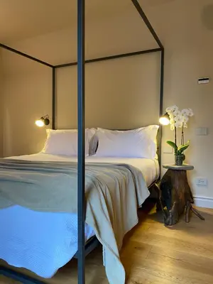 Letto o letti in una camera di Tenuta Pizzone Wine Resort