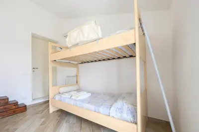 Letto o letti in una camera di 317 - CA' RONDINE - Tra le Colline e il Mare, a 15 minuti di auto dalle spiagge di Sestri Levante