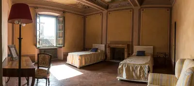 Letto o letti in una camera di Villa Bottini La Limonaia
