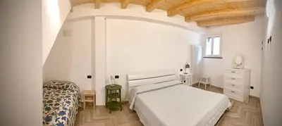 Letto o letti in una camera di Casa Sara, Levanto, in collina ad un passo dal mare!