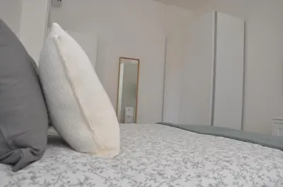 Letto o letti in una camera di Verdi Due