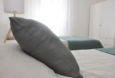 Letto o letti in una camera di Verdi Due