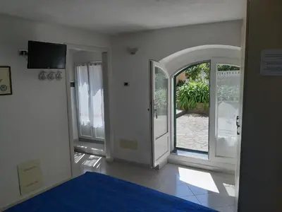 TV o dispositivi per l'intrattenimento presso Appartamento Il giardino