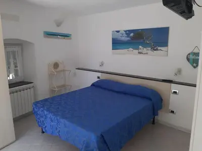 Letto o letti in una camera di Appartamento Il giardino