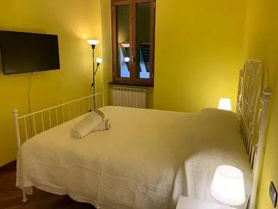 Letto o letti in una camera di Casa Entella by Vacanze in Chiavari