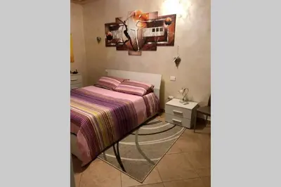 Letto o letti in una camera di La casa di Leo