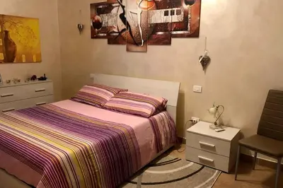 Letto o letti in una camera di La casa di Leo