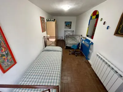 Letto o letti in una camera di Rosy apartment - Levanto, 5 Terre