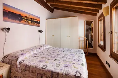 Letto o letti in una camera di BellaMantova 3
